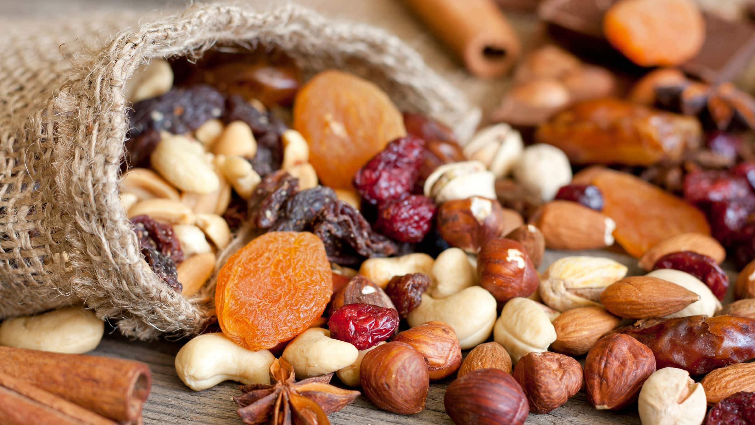 fruits, nuts, and seeds in a cornucopia